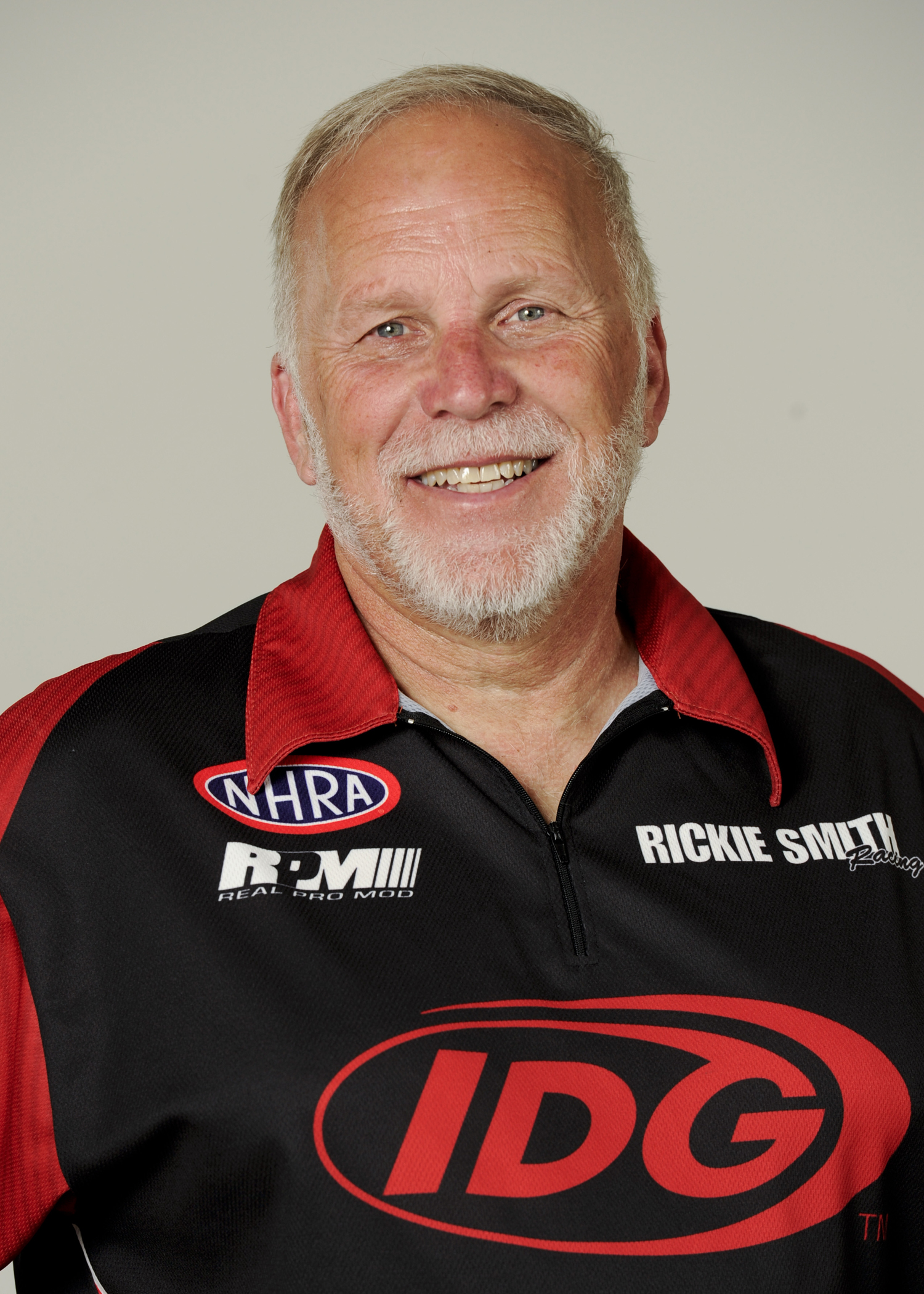 Defending NHRA J&amp;A Service Pro Mod Series world champion Rickie Smith raced to the qualifying lead Friday at the Summit Racing Equipment NHRA Nationals. - 2015_Rickie_Smith_Head
